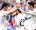 La Liga: Ronaldo treble as Real hit eight, Atletico held