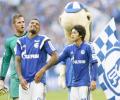 Bundesliga: Schalke shock Dortmund in derby, Bayern win