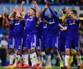 EPL PHOTOS: Chelsea inch towards title with gritty United win