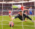 FA Cup PHOTOS: Reading keeper errs to help Arsenal make final