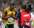 Tired Bolt and Gatlin take it easy in 200 metres heats