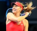 Sharp Sharapova returns to form to reach fourth round