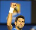 Djokovic fends off Muller to reach quarter-finals