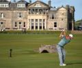 British Open: Leader Johnson holds firm; Woods misses cut