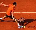 Djokovic still faces rocky road to elusive French Open glory