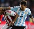 Messi scores but Paraguay hold Argentina to a 2-2 draw