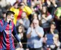 Messi breaks La Liga hat-trick record as Barca go top