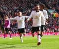 Mata strikes twice as United down 10-man Liverpool