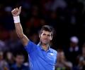 Djokovic survives tricky test, Nishikori off to flying start