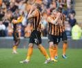 Hull relegated as Newcastle survive on final day of drama