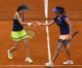 Saina, Paes, Bopanna advance in doubles at French Open