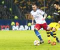 Bundesliga: Hamburg surprise Dortmund as league resumes amid tight security