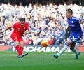 EPL PHOTOS: Coutinho sizzles in Liverpool's 'special' win at Chelsea