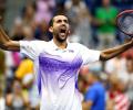 US Open PHOTOS: Cilic, Vinci fight their way into semis