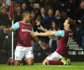 EPL PHOTOS: Hammer Payet's double sees Newcastle slide to bottom