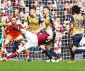 EPL PHOTOS: Carroll scores hat-trick as West Ham hold Arsenal; Chelsea lose