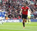 United edge Everton to enter FA Cup final after Martial's late goal