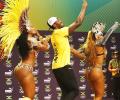 PIX: In search of star power, media lap up Usain Bolt show...