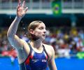 Ledecky smashes record in 800m to take freestyle treble