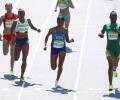 Semenya cruises in 800m heats; Farah survives scare to reach 5,000m final