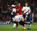 EPL PHOTOS: Man United sink Spurs; Chelsea go top