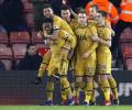 EPL PHOTOS: Alli double helps Spurs sink 10-man Southampton