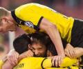 Dortmund reach 13th Cup semis amid ticket protest by Stuttgart fans