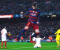 Barca launch fight back to down Sevilla; equal La Liga win record