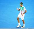 Aus Open PHOTOS: Federer, Djoko, Sharapova cruise; Wozniacki stunned