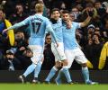 Aguero heads Manchester City into League Cup final against Liverpool