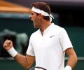 PHOTOS: Del Potro knocks out Wawrinka, Serena and Venus survive