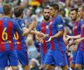 Messi quiet but Barcelona stroll past Celtic