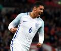 PHOTOS: Smalling smiling after England sink Portugal