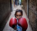 Boxing school in Rio slum shows sport's power before Olympics