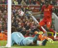 EPL PIX: Benteke salvages point for Liverpool; Norwich go down