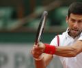 French Open PIX: Djoko back on top before rain stops play, Radwanska exits