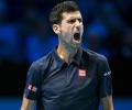 PHOTOS: Djokovic digs deep to repel Raonic onslaught