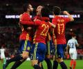 PHOTOS: Spain rally to hold England; Italy vs Germany goalless