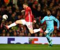 PHOTOS: Rooney ignites Man Utd; Inter slump out of Europe