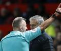 PHOTOS: Mourinho sent off on bad day for United; Arsenal win again