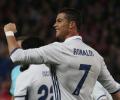 La Liga: Ronaldo treble sinks Atletico, Barcelona held