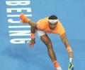 China Open: Nadal eases into quarters