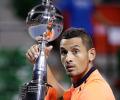 Kyrgios keeps cool to win Japan Open