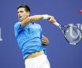 PHOTOS: Djokovic shakes off rust, to face Tsonga in quarters