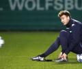 Wenger surprised by Bendtner's move to Forest