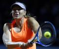 Sharapova marks comeback from doping ban with win over Vinci