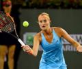 Gutsy Mladenovic ends Sharapova comeback at Stuttgart