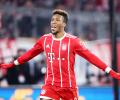 Football Briefs: Coman steers Bayern past Hanover, Dortmund held