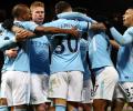 EPL PHOTOS: City down United in derby; Arsenal and Liverpool held