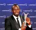 PHOTOS: Bolt wins top honour at Laureus for record-equalling 4th time!